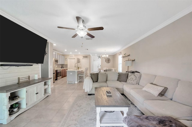 14716 Crescent Rock Dr, Wimauma, FL 33598 - living room featuring a ceiling fan, ornamental molding, light tile patterned floors, a chandelier, and recessed lighting