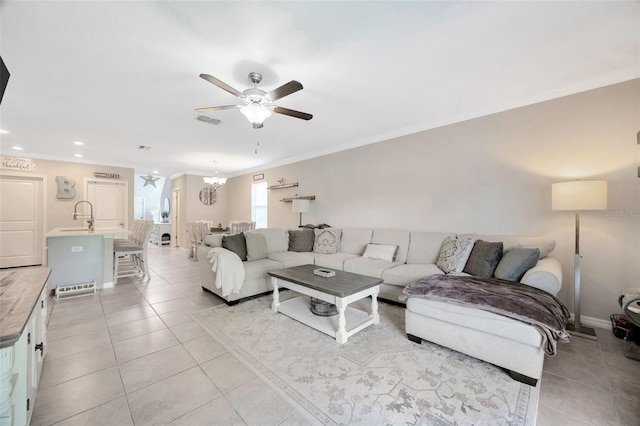 14716 Crescent Rock Dr, Wimauma, FL 33598 - living area featuring ceiling fan, light tile patterned flooring, ornamental molding, a chandelier, and recessed lighting