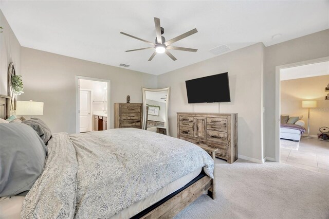 14716 Crescent Rock Dr, Wimauma, FL 33598 - bedroom featuring baseboards, connected bathroom, carpet, and ceiling fan