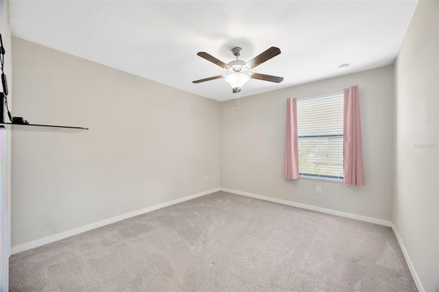 14716 Crescent Rock Dr, Wimauma, FL 33598 - unfurnished room featuring carpet, ceiling fan, and baseboards