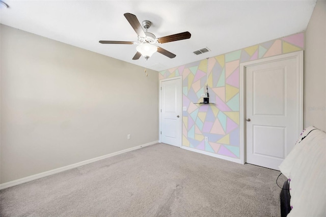 14716 Crescent Rock Dr, Wimauma, FL 33598 - unfurnished bedroom with carpet flooring, baseboards, and a ceiling fan