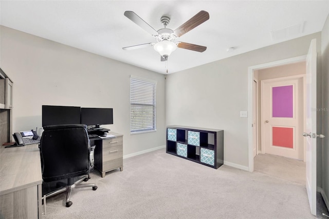 14716 Crescent Rock Dr, Wimauma, FL 33598 - office with a ceiling fan, light carpet, and baseboards