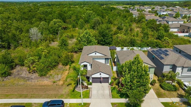 14716 Crescent Rock Dr, Wimauma, FL 33598 - aerial perspective of suburban area featuring a forest