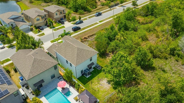 14716 Crescent Rock Dr, Wimauma, FL 33598 - aerial perspective of suburban area with a pool and a large body of water