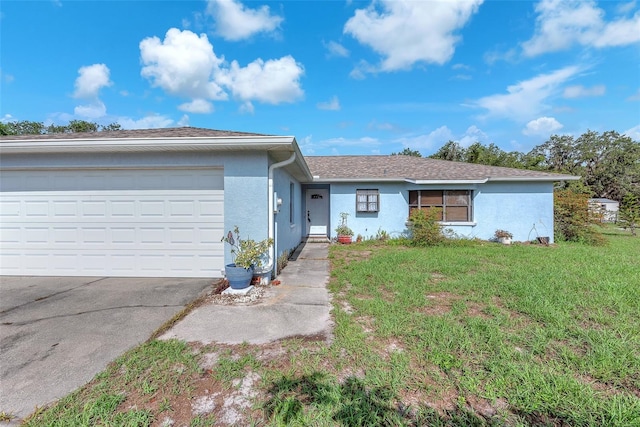 17023 Alderman Turner Rd, Wimauma, FL 33598 - single story home featuring stucco siding, a front lawn, driveway, and an attached garage