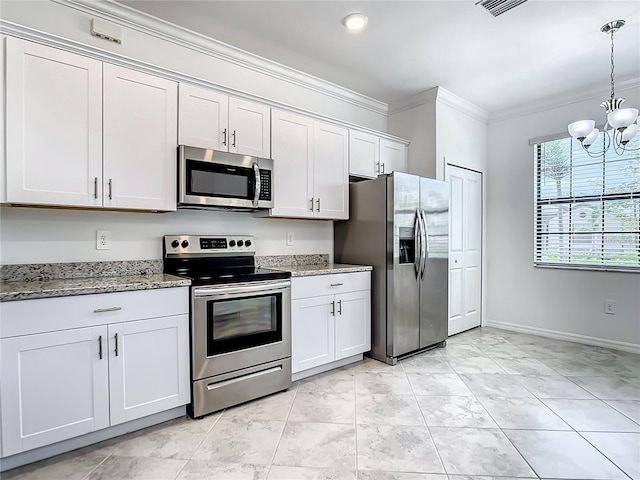 11100 Balfour St, Venice, FL 34293 - kitchen with appliances with stainless steel finishes, a chandelier, crown molding, light stone counters, and pendant lighting