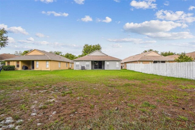 15709 Leatherleaf Ln, Land O Lakes, FL 34638 - rear view of property with central AC
