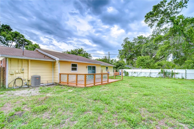 40019 Pretty Redbird Rd, Zephyrhills, FL 33540 - view of yard featuring a deck and cooling unit