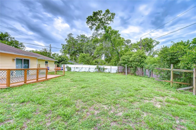 40019 Pretty Redbird Rd, Zephyrhills, FL 33540 - view of yard with a wooden deck