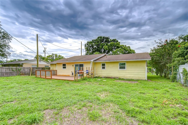 40019 Pretty Redbird Rd, Zephyrhills, FL 33540 - rear view of property with a wooden deck