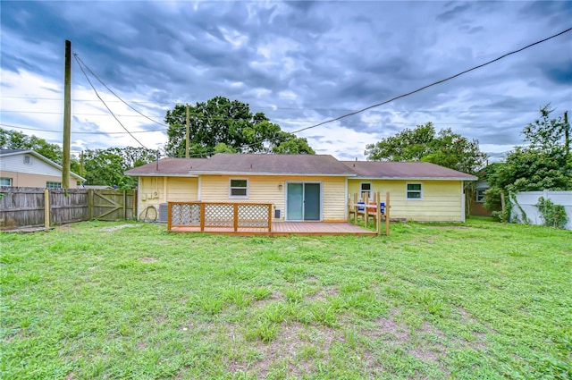 40019 Pretty Redbird Rd, Zephyrhills, FL 33540 - rear view of property with a deck