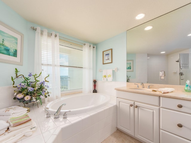 1170 Gulf Blvd Unit 1006, Clearwater Beach, FL 33767 - bathroom featuring vanity, a garden tub, and recessed lighting
