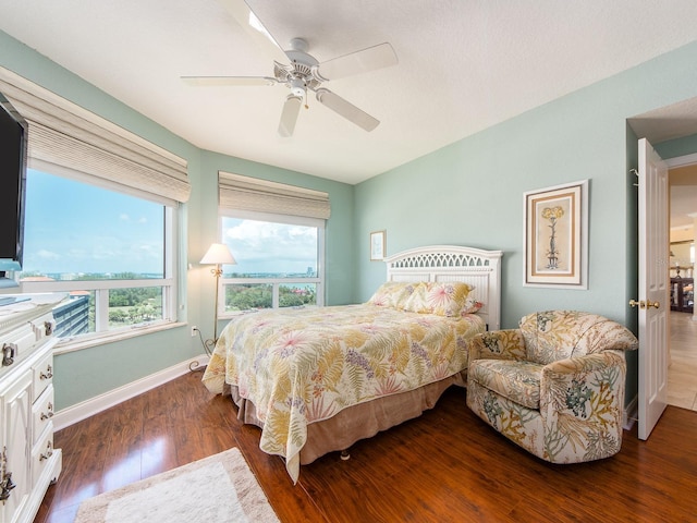 1170 Gulf Blvd Unit 1006, Clearwater Beach, FL 33767 - bedroom with wood finished floors and a ceiling fan