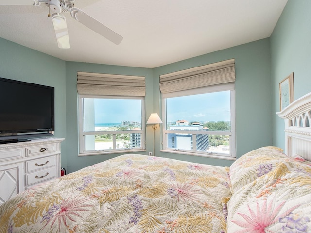 1170 Gulf Blvd Unit 1006, Clearwater Beach, FL 33767 - bedroom featuring multiple windows and ceiling fan