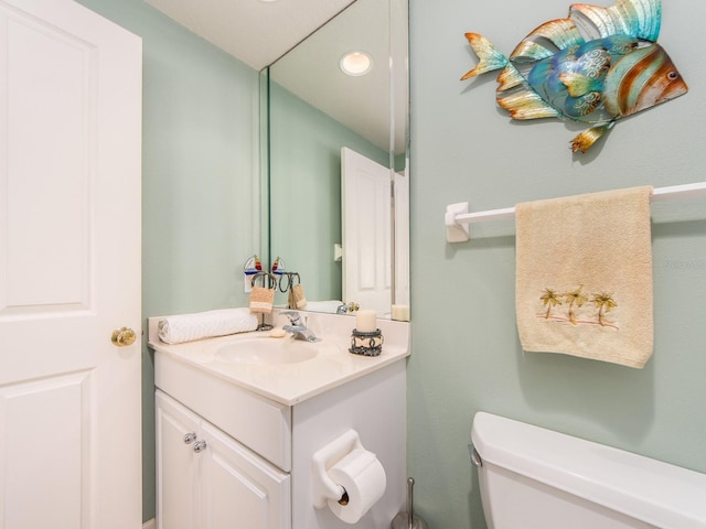 1170 Gulf Blvd Unit 1006, Clearwater Beach, FL 33767 - half bathroom with vanity, toilet, and recessed lighting
