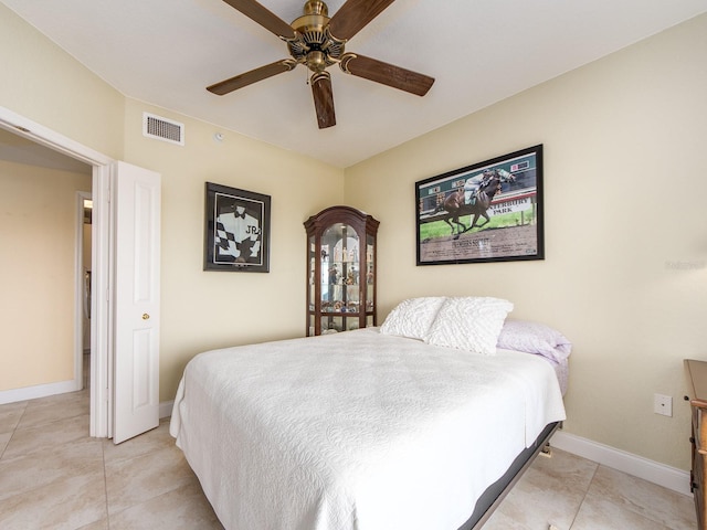 1170 Gulf Blvd Unit 1006, Clearwater Beach, FL 33767 - bedroom featuring light tile patterned floors, baseboards, and a ceiling fan