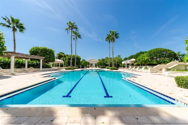 1170 Gulf Blvd Unit 1006, Clearwater Beach, FL 33767 - community pool with a pergola and a patio area