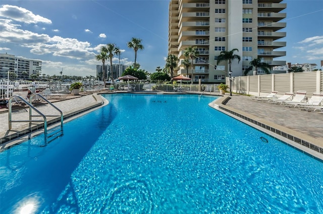 1621 Gulf Blvd Unit 407, Clearwater Beach, FL 33767 - community pool featuring a patio area