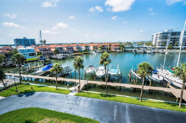 1621 Gulf Blvd Unit 407, Clearwater Beach, FL 33767 - water view with boat lift and a boat dock