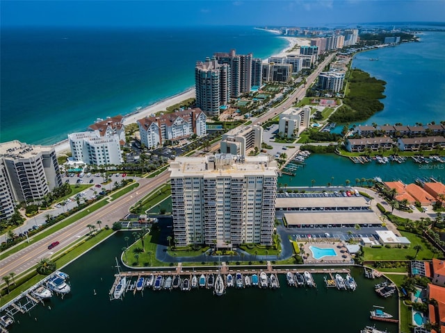 1621 Gulf Blvd Unit 407, Clearwater Beach, FL 33767 - aerial view of property's location featuring a nearby body of water, numerous boat docks, and nearby urban area