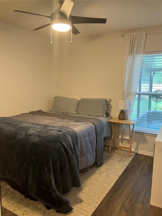6905 Summer Harbor Ln, Riverview, FL 33578 - bedroom with wood finished floors, baseboards, and a ceiling fan