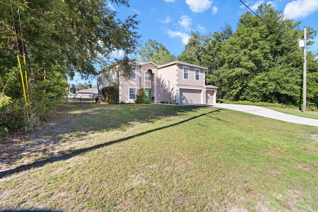 2541 W Castle Rd, Citrus Springs, FL 34434 - traditional-style home featuring a garage, stucco siding, and driveway