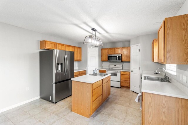2541 W Castle Rd, Citrus Springs, FL 34434 - kitchen with appliances with stainless steel finishes, a sink, an island with sink, light countertops, and a textured ceiling