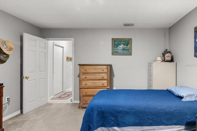 2541 W Castle Rd, Citrus Springs, FL 34434 - bedroom featuring light colored carpet and baseboards