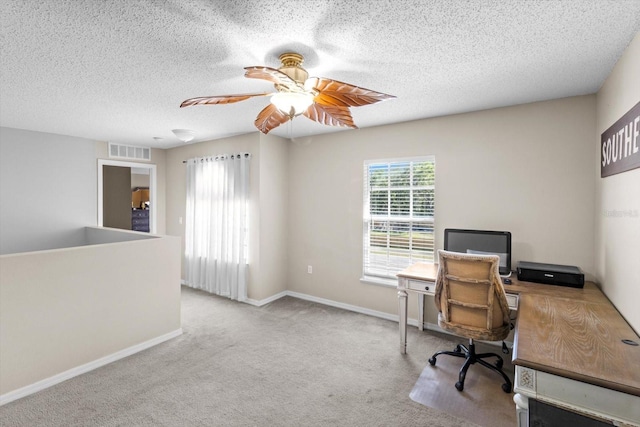 2541 W Castle Rd, Citrus Springs, FL 34434 - office area featuring a ceiling fan, baseboards, a textured ceiling, and carpet