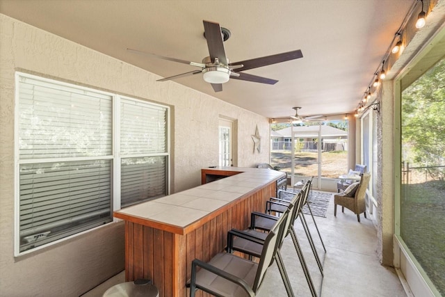 2541 W Castle Rd, Citrus Springs, FL 34434 - sunroom / solarium featuring a ceiling fan