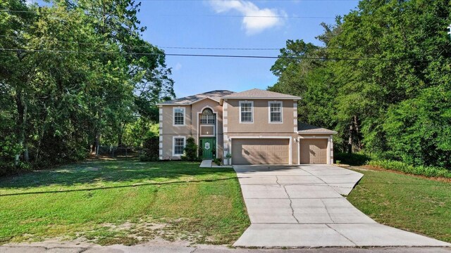 2541 W Castle Rd, Citrus Springs, FL 34434 - traditional home with stucco siding, concrete driveway, a front yard, and a garage