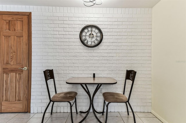 12101 Meadowbrook Ln, Hudson, FL 34667 - dining room with light tile patterned floors and baseboards