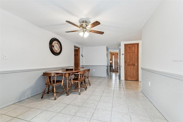 12101 Meadowbrook Ln, Hudson, FL 34667 - dining area featuring ceiling fan and light tile patterned flooring
