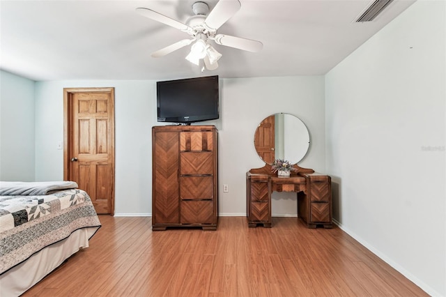 12101 Meadowbrook Ln, Hudson, FL 34667 - bedroom featuring light wood-type flooring, baseboards, and ceiling fan
