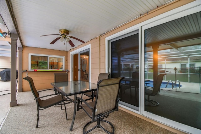 12101 Meadowbrook Ln, Hudson, FL 34667 - sunroom / solarium with ceiling fan and outdoor dining area