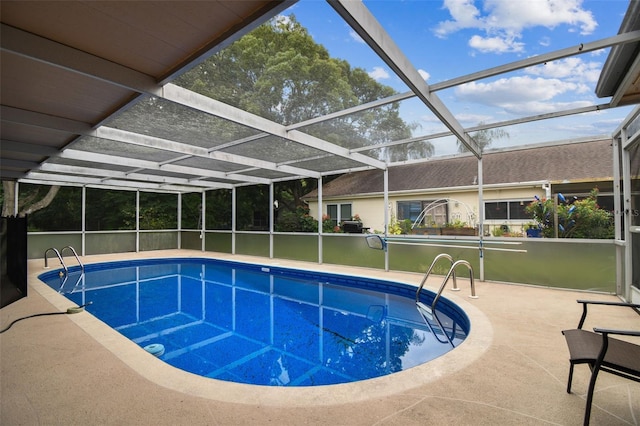 12101 Meadowbrook Ln, Hudson, FL 34667 - swimming pool featuring glass enclosure and a patio