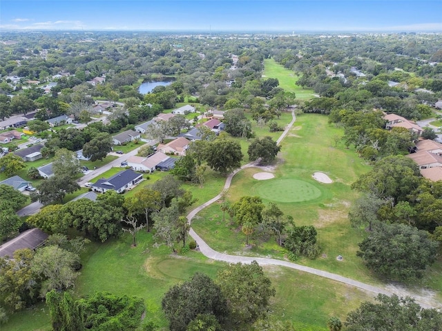 12101 Meadowbrook Ln, Hudson, FL 34667 - aerial view of property and surrounding area featuring a local golf course and nearby suburban area