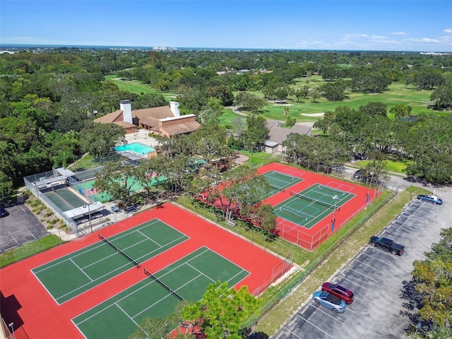 12101 Meadowbrook Ln, Hudson, FL 34667 - bird's eye view of a pool area and a local golf course