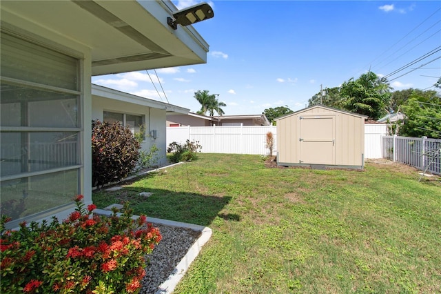 13898 Jamaica Dr, Seminole, FL 33776 - fenced backyard with a storage unit