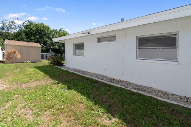 13898 Jamaica Dr, Seminole, FL 33776 - view of green lawn featuring an outdoor structure