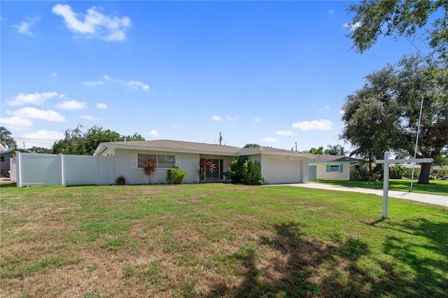 13898 Jamaica Dr, Seminole, FL 33776 - single story home featuring driveway, a garage, and stucco siding