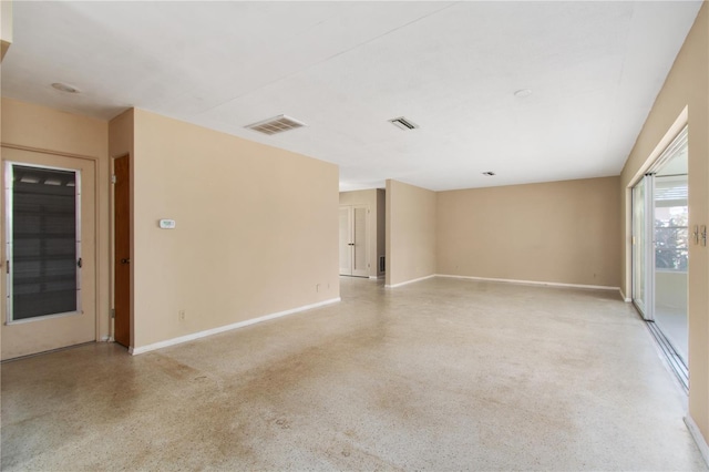 13898 Jamaica Dr, Seminole, FL 33776 - unfurnished room with speckled floor