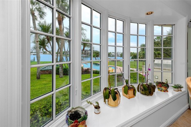 224 Harbor View Ln, Largo, FL 33770 - sunroom featuring a water view
