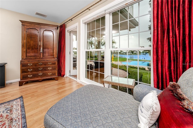 224 Harbor View Ln, Largo, FL 33770 - bedroom featuring wood finished floors and baseboards