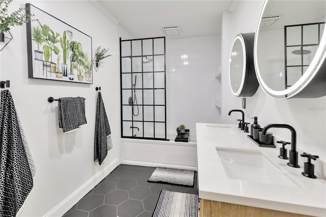 9615 Raiden Ln, Riverview, FL 33569 - bathroom with tile patterned floors, double vanity, shower / bathtub combination, and baseboards