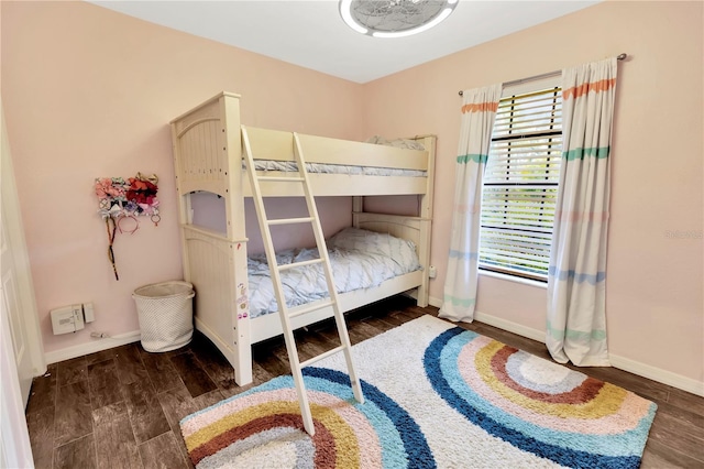 9615 Raiden Ln, Riverview, FL 33569 - bedroom featuring baseboards and wood finished floors