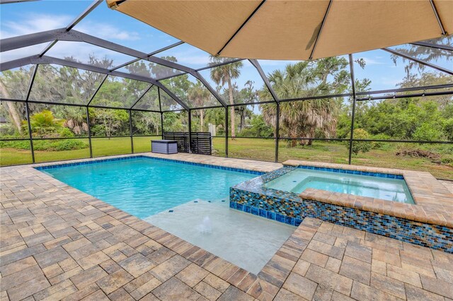 9615 Raiden Ln, Riverview, FL 33569 - view of swimming pool featuring a patio, glass enclosure, a lawn, and a pool with connected hot tub
