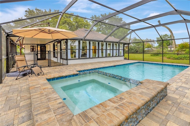 9615 Raiden Ln, Riverview, FL 33569 - view of pool with a patio, a pool with connected hot tub, and a lanai