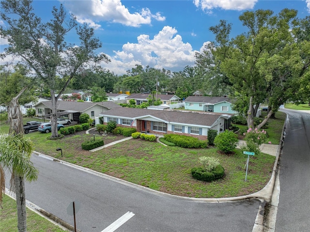 140 Morrow Cir, Brandon, FL 33510 - view of front of house with a residential view and a front lawn