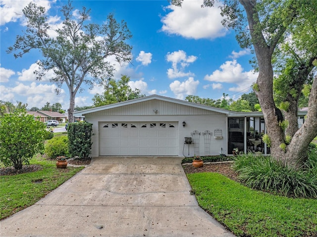 140 Morrow Cir, Brandon, FL 33510 - ranch-style house with concrete driveway and an attached garage